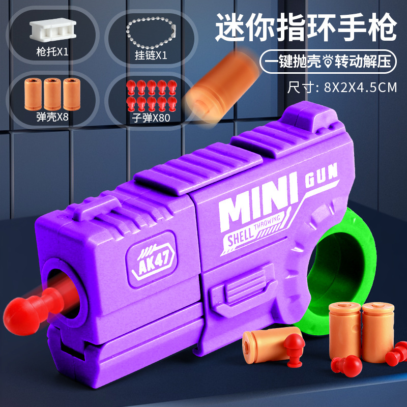 Mini dedo para niños, anillo de descompresión, pistola giratoria, puede lanzar proyectiles, juguetes geniales, juguetes novedosos para niños al por mayor