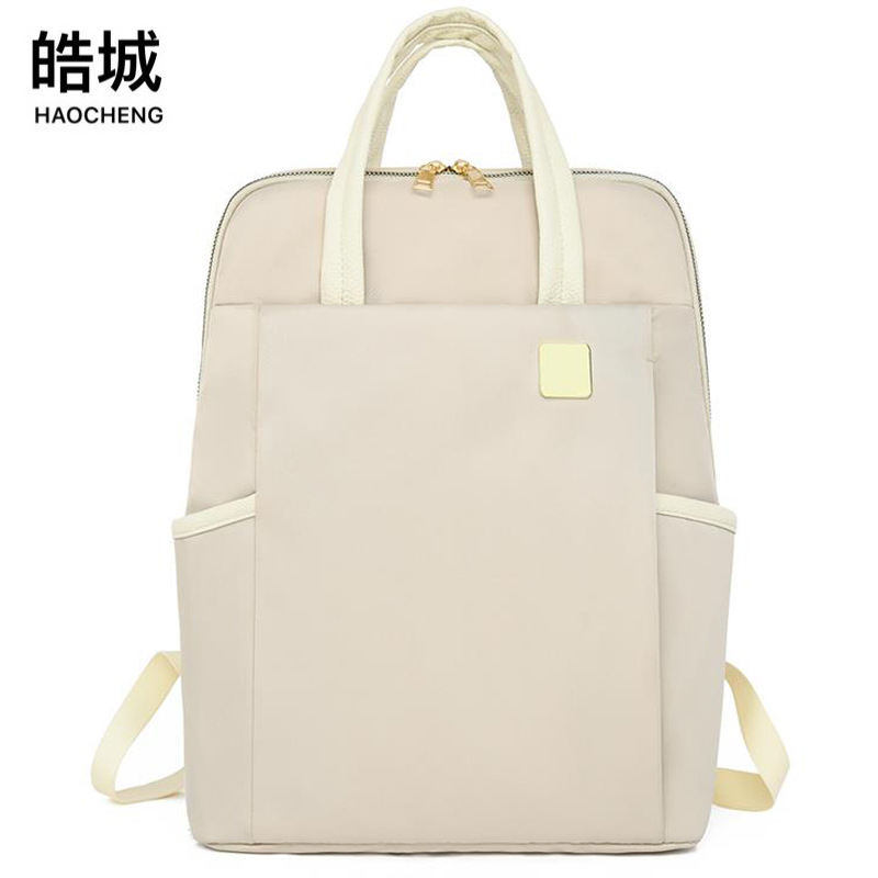 Mochila portátil de gran capacidad para mujer 2024 nueva bolsa de computadora de viaje de viaje casual mochila de documento simple al por mayor