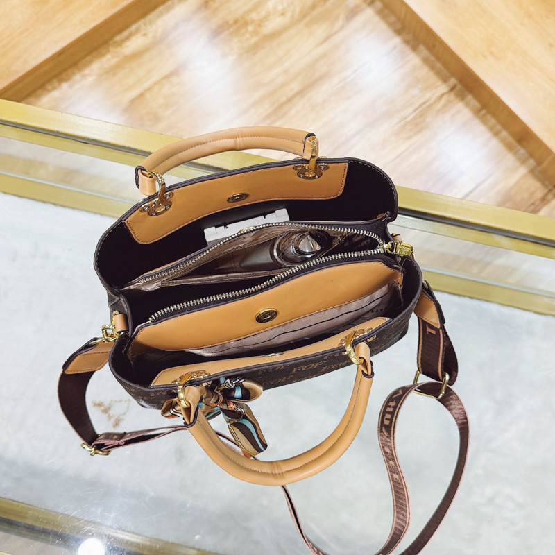 Luz lujosa moda popular bolso de mano transfronterizo nuevo retro letras impresión bolso de hombro texturas PU mochila