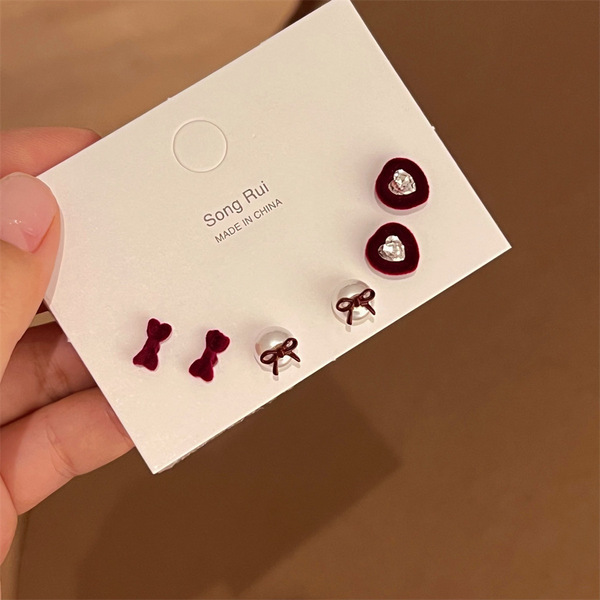 Demi-season earrings with bow