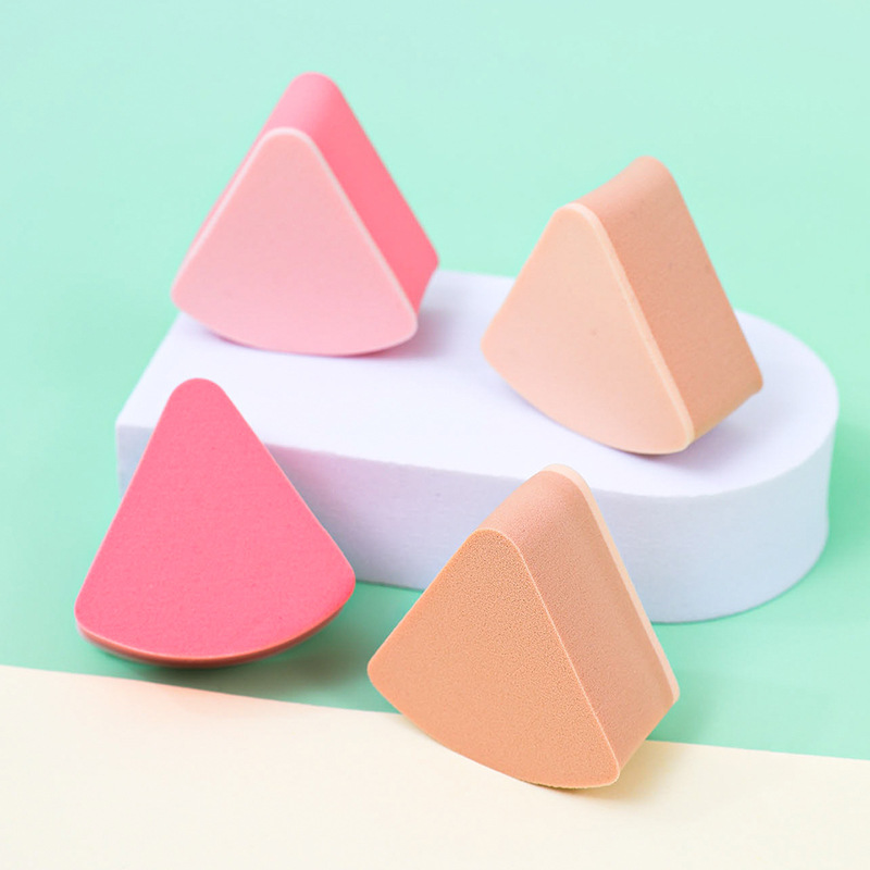 Fábrica personalizada de polvo de esponja triangular no comer polvo seco y húmedo de doble uso en agua de remojo para aumentar el maquillaje no látex de gel de goma cosmética