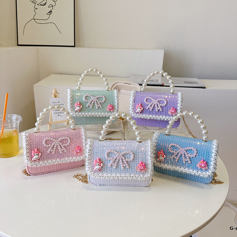 2025 nuevo lindo arco princesa bolsa de perlas portátil moda versátil mochila de hombro bolso de cambio coreano