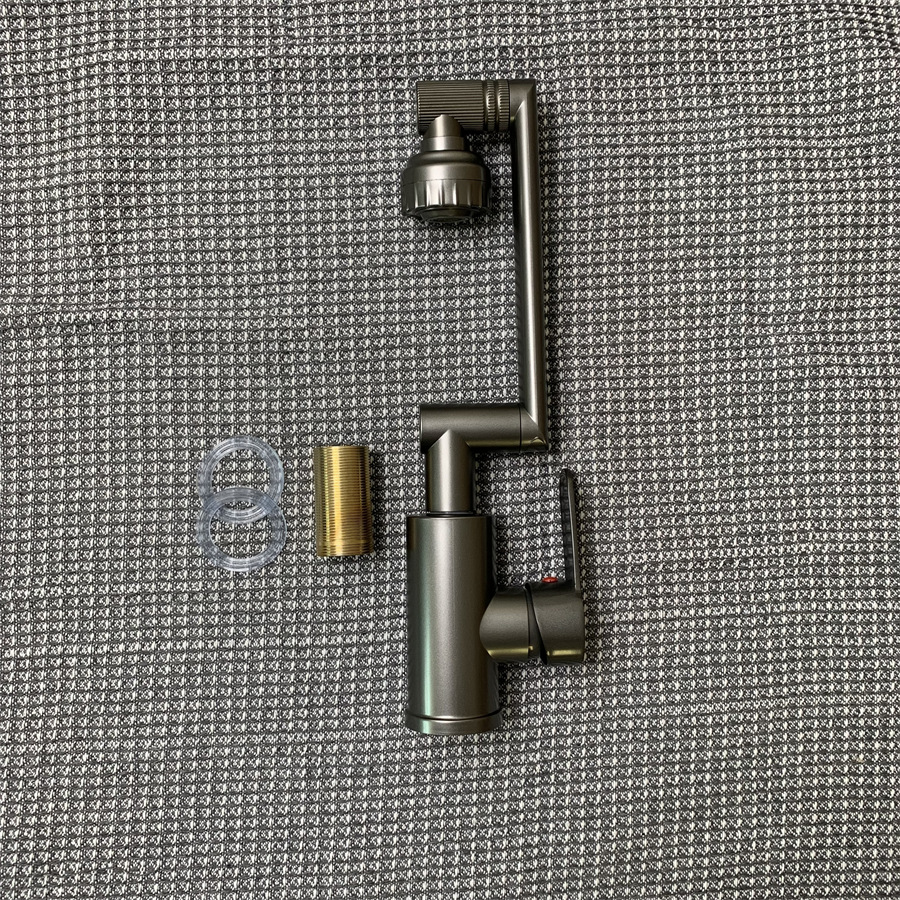 Cross-border Lucky Cat Cuenca lavabo baño mueble de baño caliente y fría de doble uso del grifo brazo mecánico rotación Universal