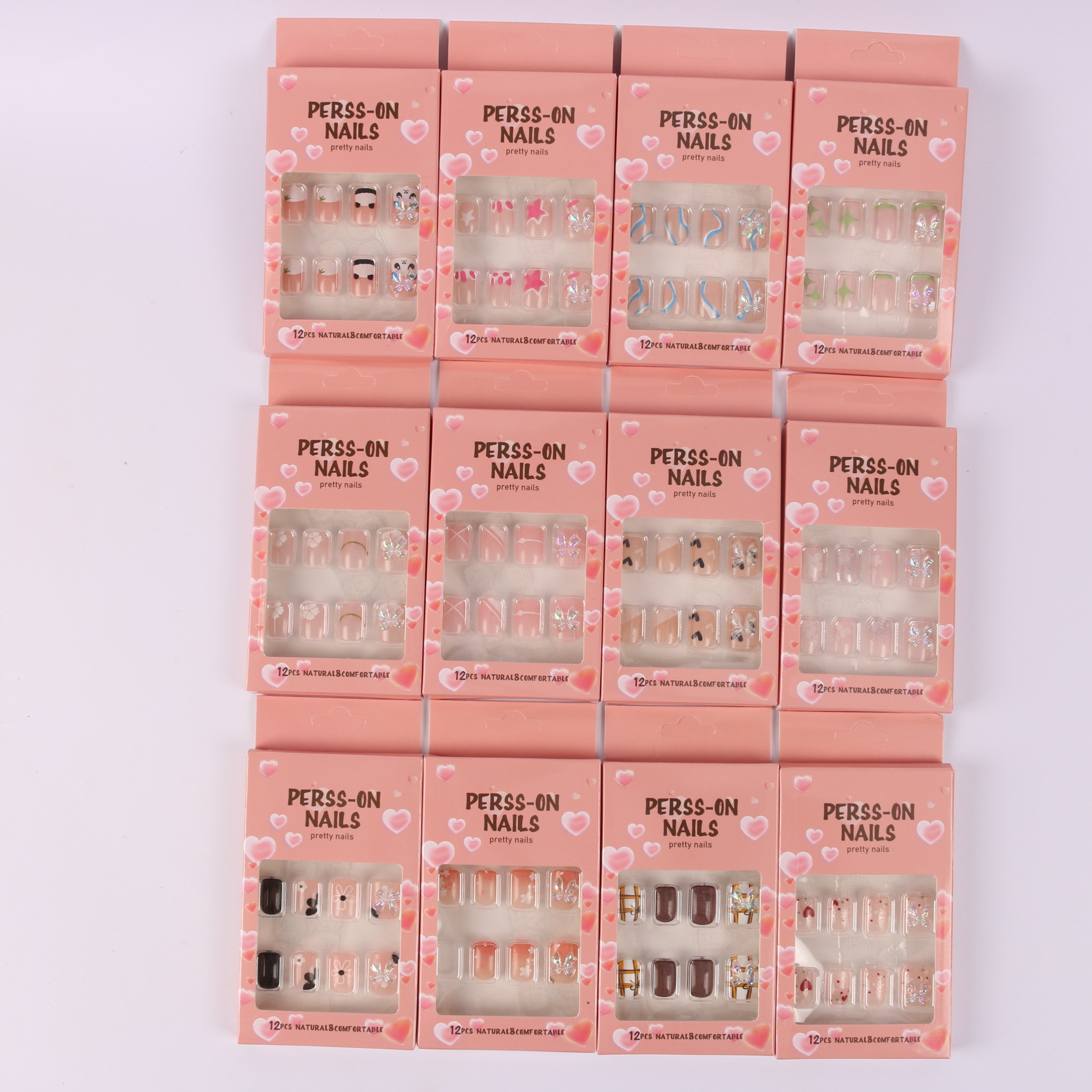 Ventas transfronterizas de uñas calientes desgastadas más taladro de uñas de ojo de gato mezcladas parches de uñas falsas fábrica al por mayor