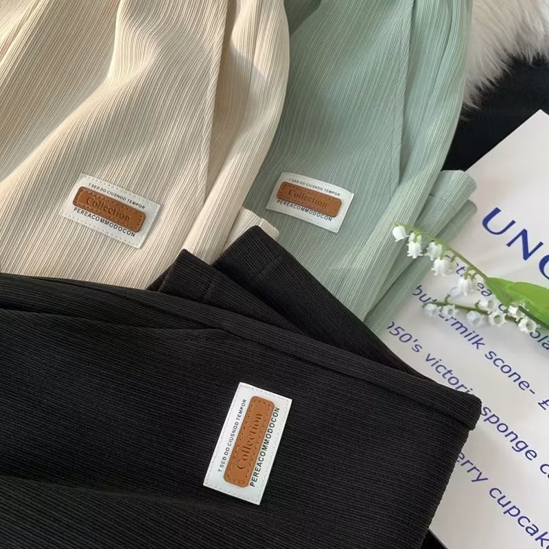 Pantalones cortos de seda de hielo de verano serie de sal suelta para hombres 2023 nuevos pantalones casuales de pierna ancha ins pantalones cortos rectos de moda