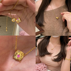 フランスのレトロな糸の猫の目の小さい金のボールのペンダントの高級感の軽い豪華な気質の小さい金の桶は玉のネックレスの女性を回転します。