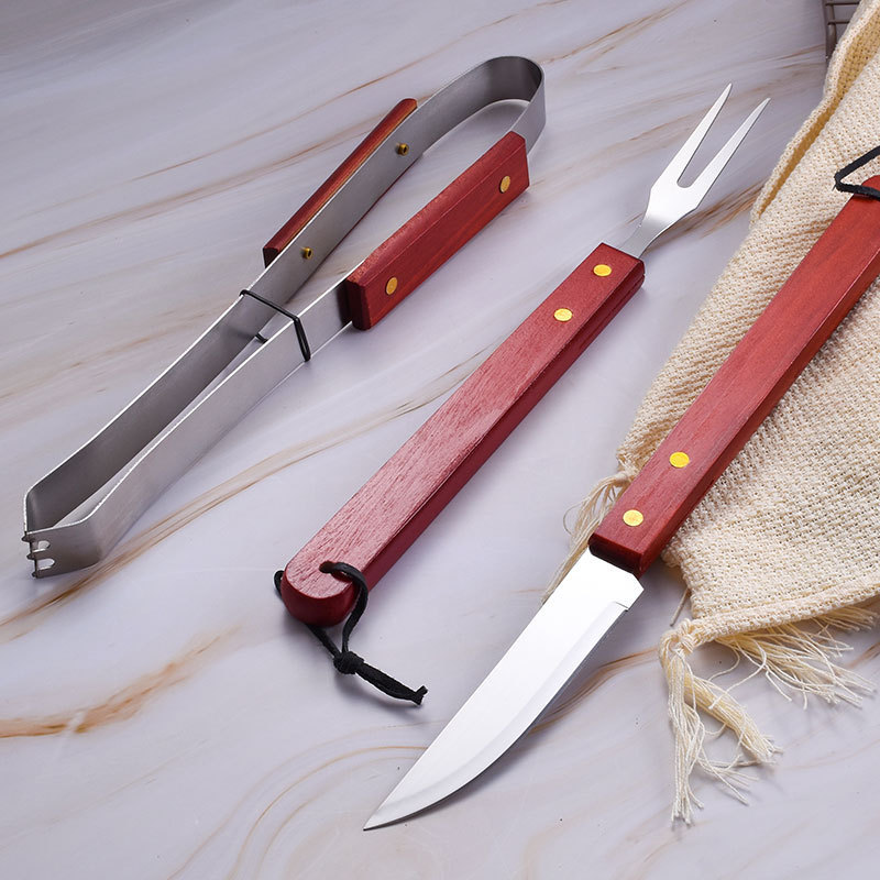 Mango de madera de acero inoxidable en stock para parrilla de tres piezas con tarjeta de aspiración para parrilla de horquilla