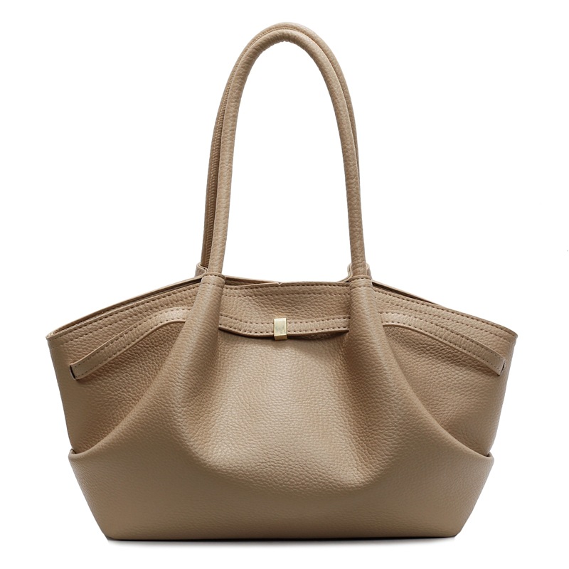 Nicho de diseño de bolsas de cubo de mano para mujeres 2025 nuevo estilo de moda de hombro bolsas de viaje de estilo retro bolsas de brazo