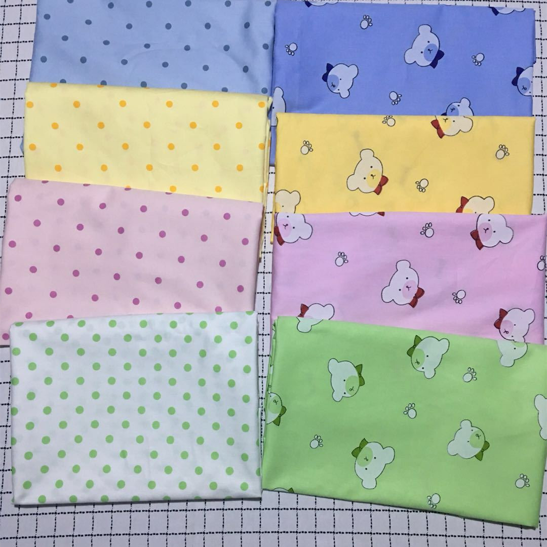 厂家全棉斜纹宝宝卡通服装布料印花面料纯棉DIY手工布料无荧剂