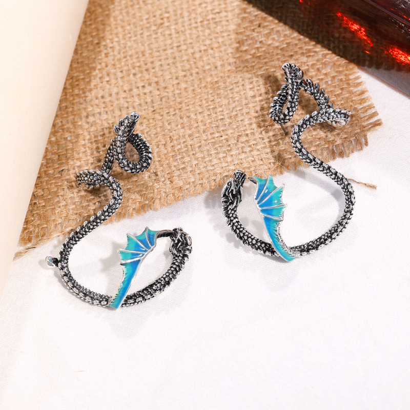 Nuevo cross-border personalizado flying dragón auriculares nicho de moda retro diseño sin agujeros de orejas para hombres y mujeres usar auriculares de alto nivel