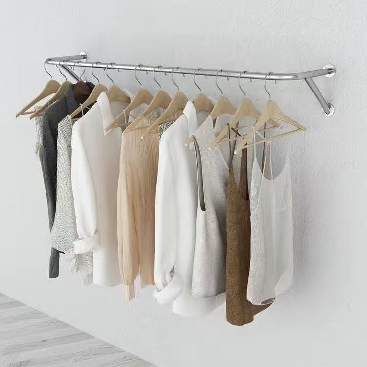 Colgar percha de ropa tienda de ropa de acero inoxidable dibujado estante de pared superior lateral colgar barra transversal espesa tienda de ropa de mujeres y niños colgar barra de ropa