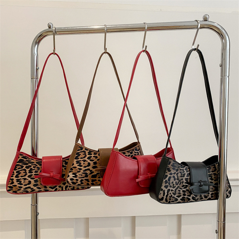 Bolsa de moda bajo la axila para mujeres de gran capacidad 2025 primavera nueva moda nicho bolso de hombro bolso de arco bolso de mano