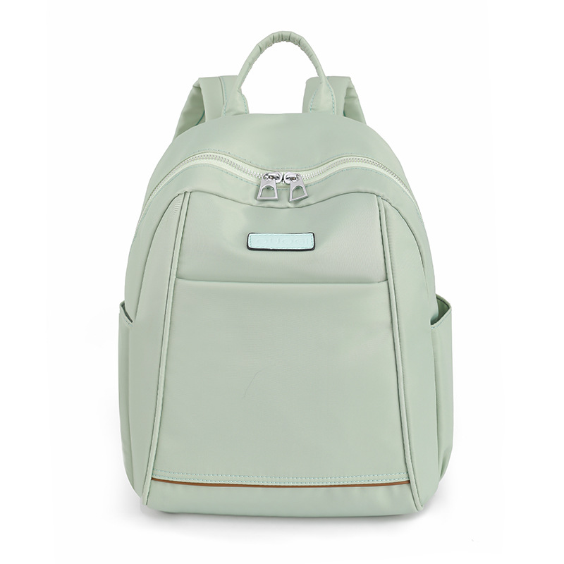 2023 nueva mochila de nailon casual para mujer, moda, literatura simple, viajes al aire libre, mochila pequeña, mochila escolar al por mayor