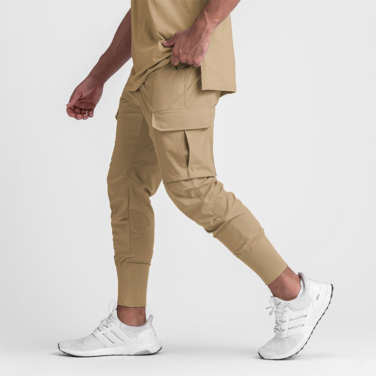 Zomer casual trendy merk multi-bag werk heren lichtbord effen kleur kleine voet mond sneldrogende sportbroek_voghion.com