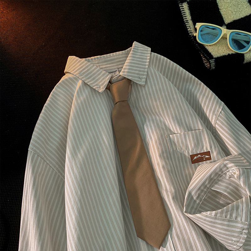 Camisa a rayas de manga larga para hombre primavera nueva camisa cityboy retro japonesa marca de moda de alta gama Pu guapo abrigo