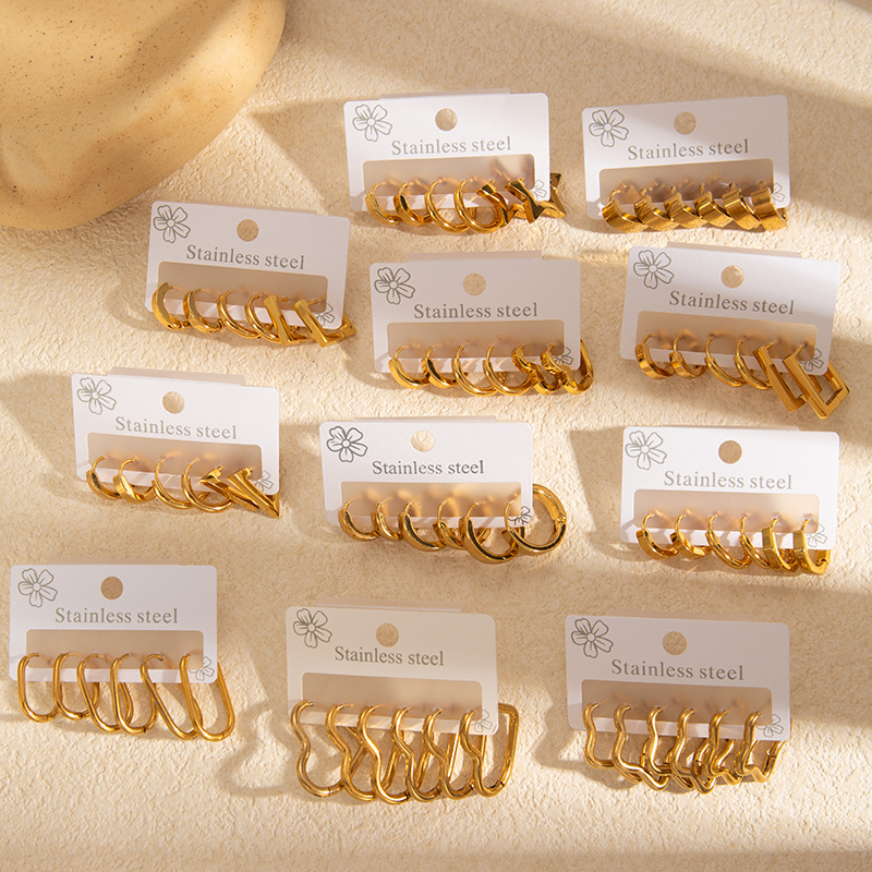 Pendientes geométricos estilo coreano, pendientes de acero inoxidable, diseño de moda de lujo ligero, pendientes de titanio con forma de corazón y estrella para mujer, transfronterizos.