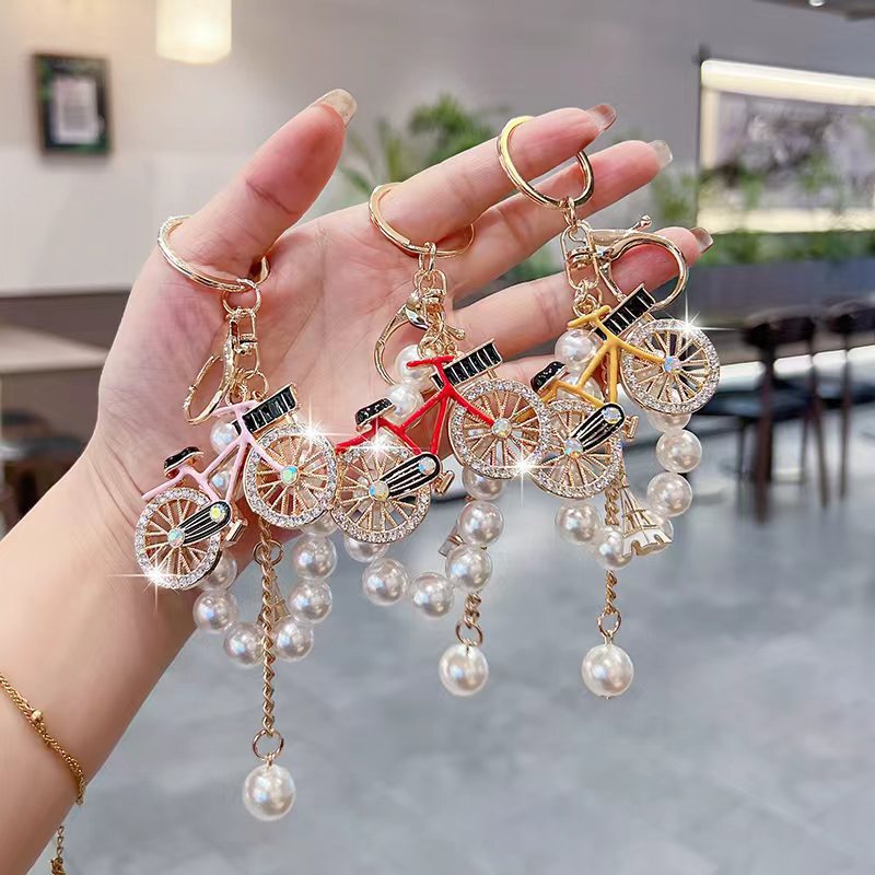 Diamond-Encrusted Alloy Bicycle Keychain for Women, Exquisite Pearl Chain Bag Pendant, Internet-Famous Eiffel Tower Metal Charm Diamond-Encrusted Alloy Bicycle Keychain for Women, Exquisite Pearl Chain Bag Pendant, Internet-Famous Eiffel Tower Metal Charm