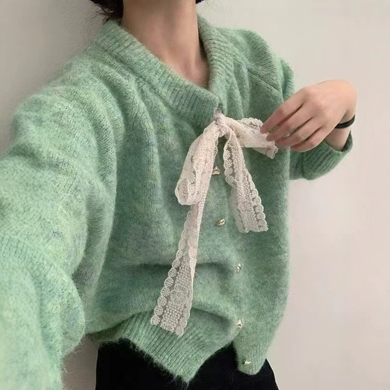 Lace bow knitted cardigan with straps for women, heart-shaped metal buckle, round neck, short, loose, gentle style sweater coat Lace bow knitted cardigan with straps for women, heart-shaped metal buckle, round neck, short, loose, gentle style sweater coat