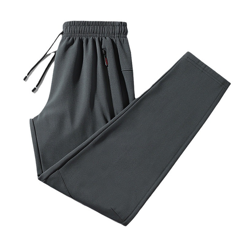 2024 pantalones gruesos de terciopelo para hombres pantalones deportivos casuales moda todo fósforo otoño e invierno pantalones deportivos delgados al por mayor