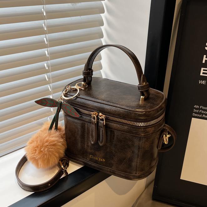 Bolso retro bolso de mano femenino 2025 nuevo bolso cuadrado pequeño de moda de todo fósforo pequeño bolso de mensajero de hombro de alta gama para viajeros de nicho