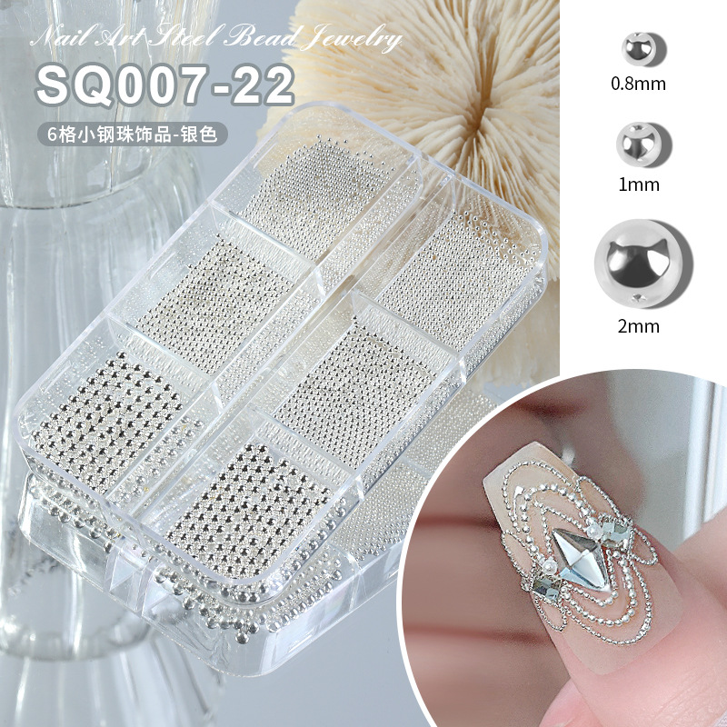 Celebridad de Internet mismo estilo joyería de uñas pequeña bola de acero desgaste paquete de material de uñas accesorios de decoración de taladro de uñas pequeña joyería al por mayor