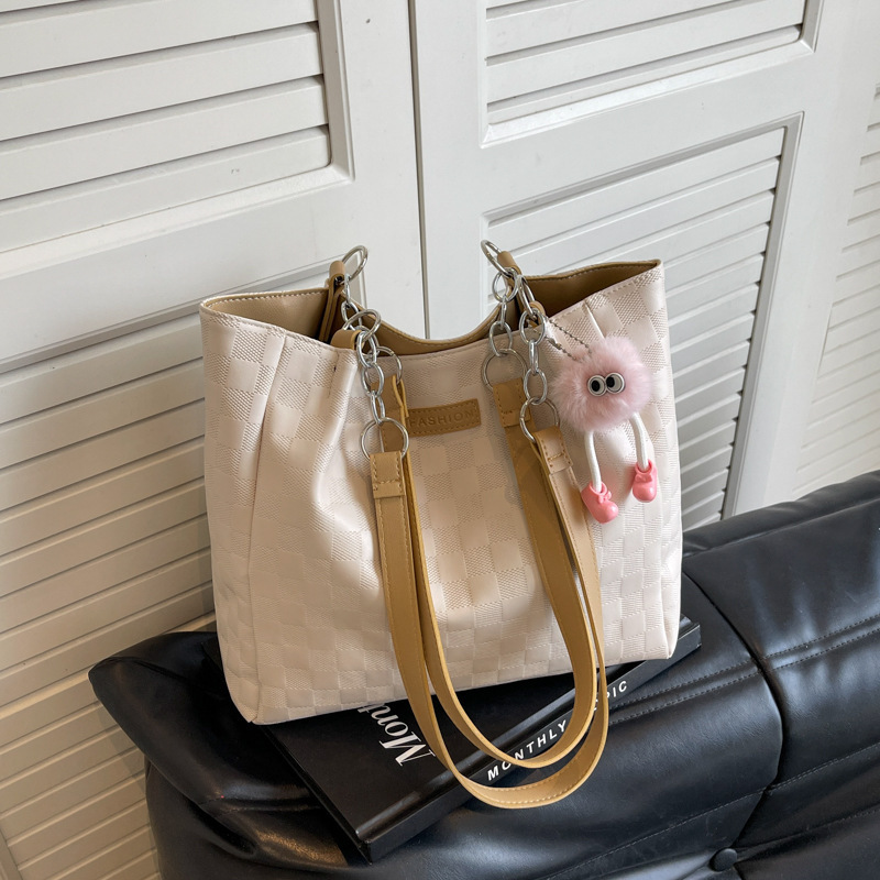 Bolsa de hombro a cuadrillas de alto nivel 2024, nueva bolsa de viaje simple de gran capacidad para estudiantes universitarios.