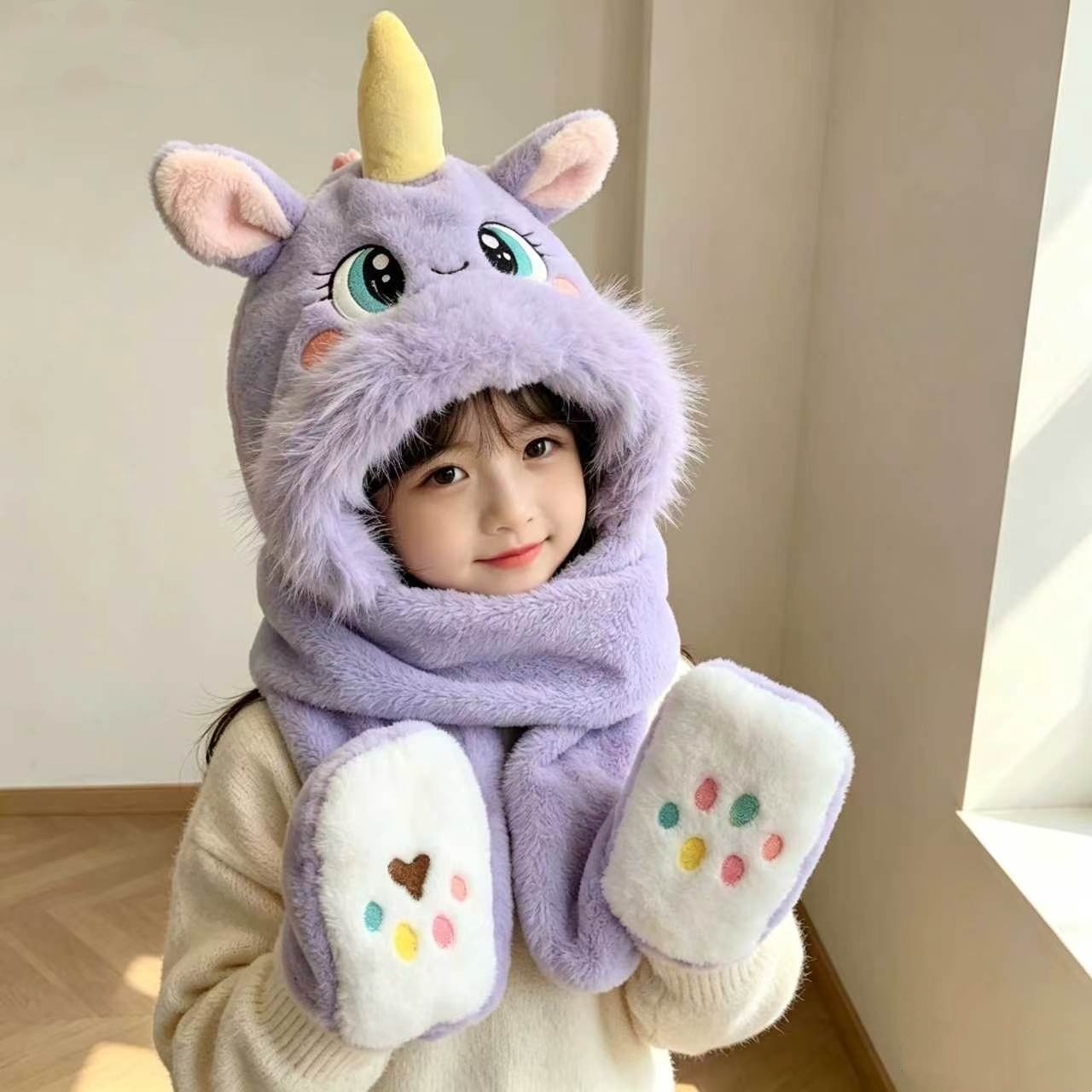 New winter children's hat, featuring a cute unicorn design, a 3-in-1 style, and ear protection for warmth and cold weather. It's a plush hat suitable for both boys and girls