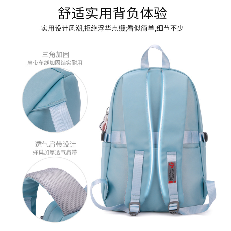 Natural Fish nueva mochila para estudiantes de escuela primaria 3-6 grado de Gran capacidad de protección ligera de la columna vertebral impermeable de una sola pieza de entrega