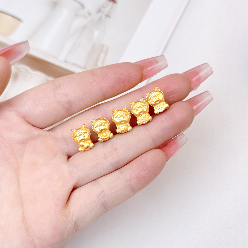 Arena antigua oro Zodiaco dragón DIY accesorios de joyería tridimensional imitación oro 3D afortunado lindo dragón cien accesorios a juego al por mayor