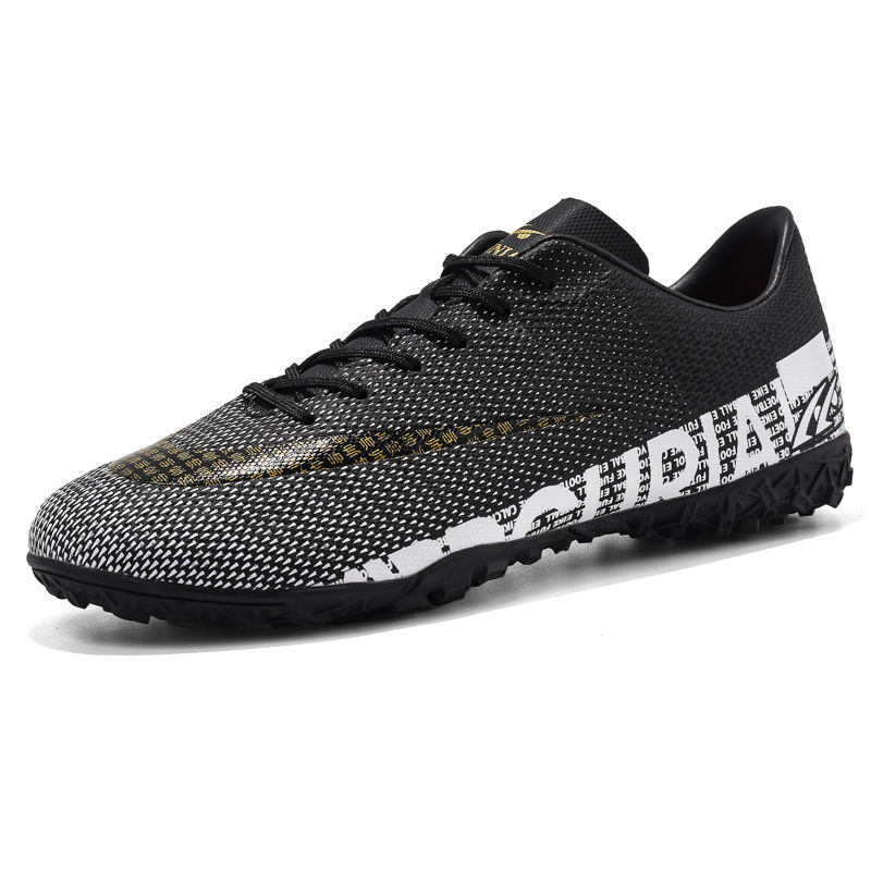 Zapatos de fútbol masculinos Ronaldo Assassin CR7 clavos cortos zapatos de entrenamiento de entrenamiento de carreras de estudiantes
