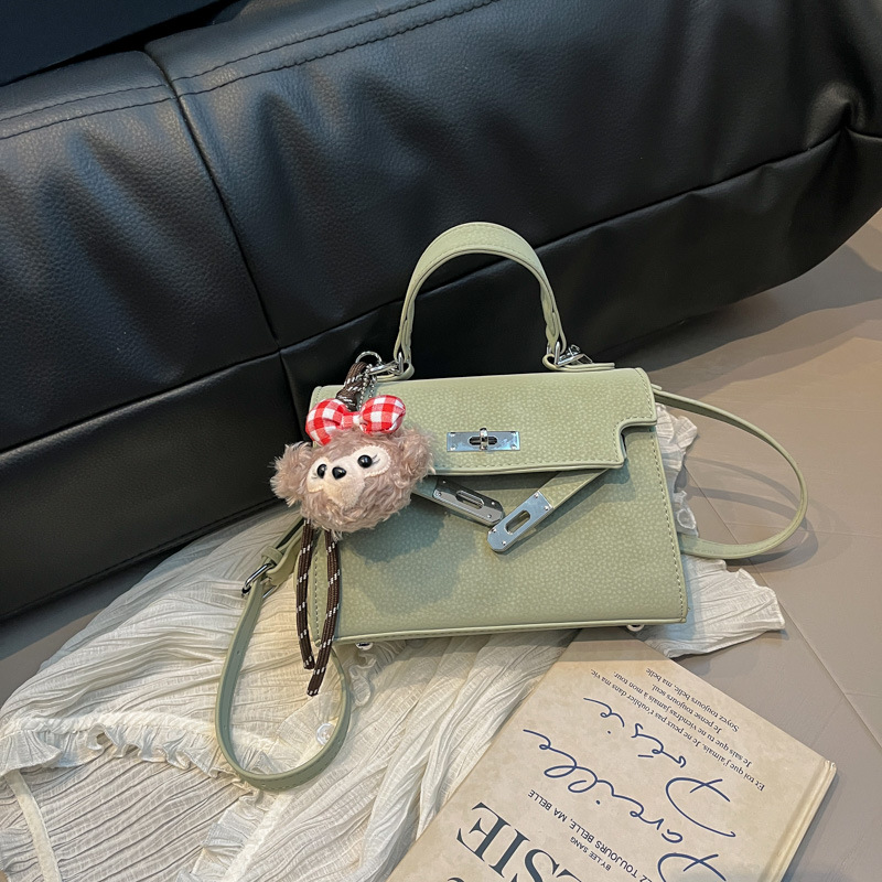 Bolsos de nuevo estilo de verano para mujer 2025 moda de alta calidad bolso de mensajero de un solo hombro bolso de Kelly portátil de nicho