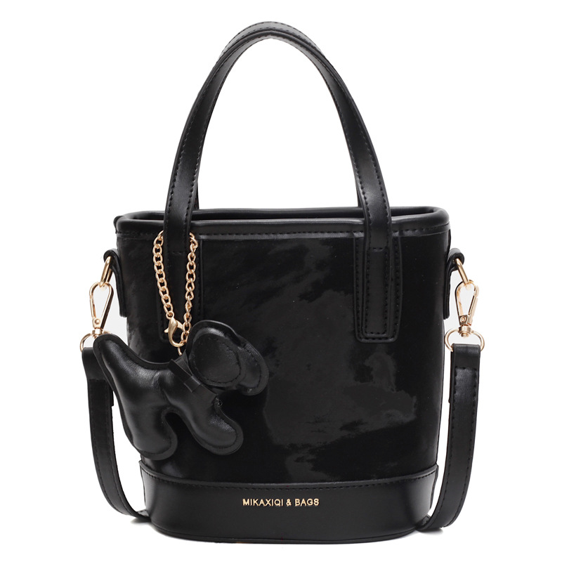 Este año, la popular bolso de mano super caliente para mujeres 2025 nuevo bolso de cubo retro versátil de alto nivel sensación de hombro mochila