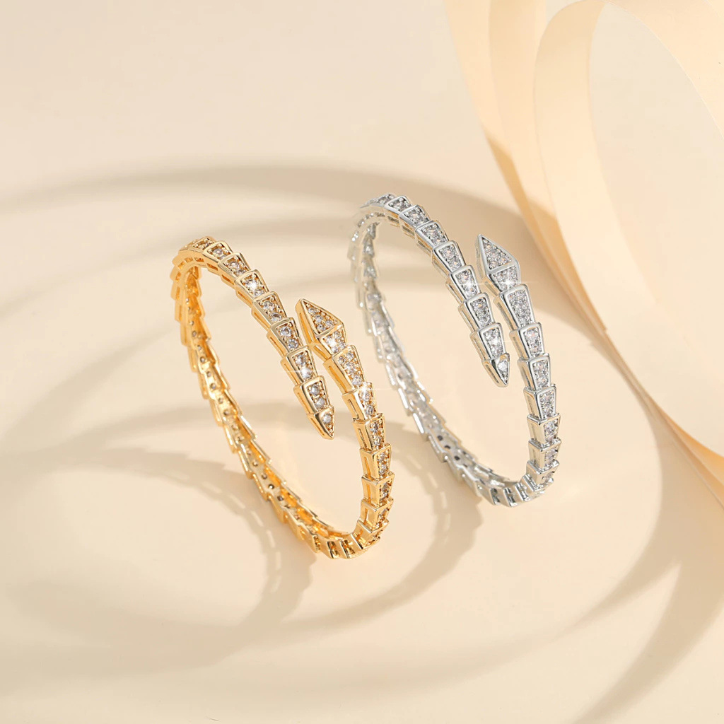 Nuevo creativo transfronterizo de pulsera de hueso de serpiente de diamante completo moda europea y americana de comercio electrónico temperamento de alto nivel de tendencia pulsera de cobre al por mayor