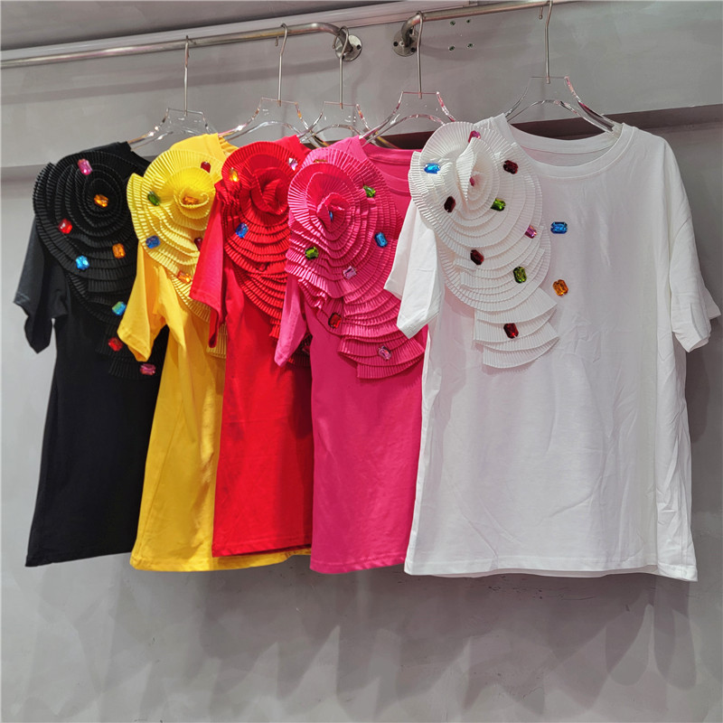 Verano coreano cuello redondo color sólido industria pesada flor mujer manga corta camiseta recta moda todo fósforo plisado suelto