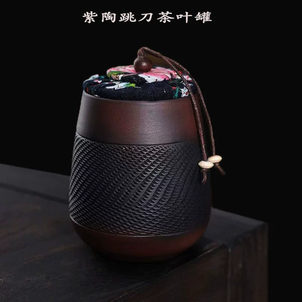 Purple pottery jumping knife tea can