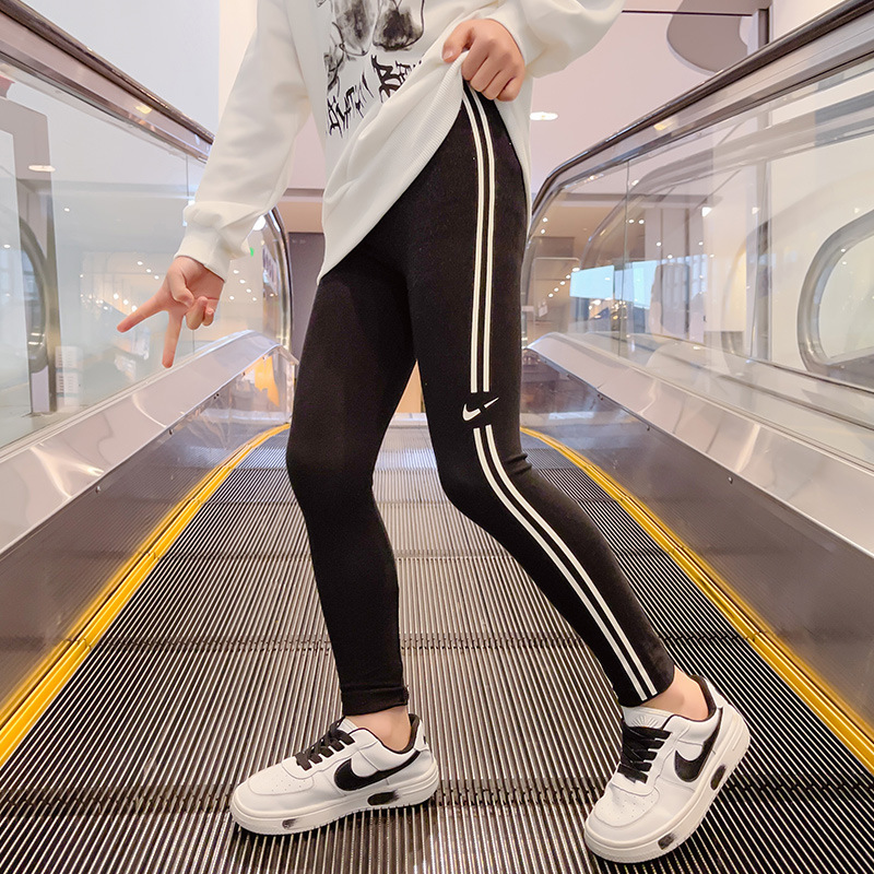 Polainas de las niñas de primavera y otoño nuevas niñas medias y grandes niños pantalones de todo fósforo ropa exterior de moda Pantalones de los niños de moda