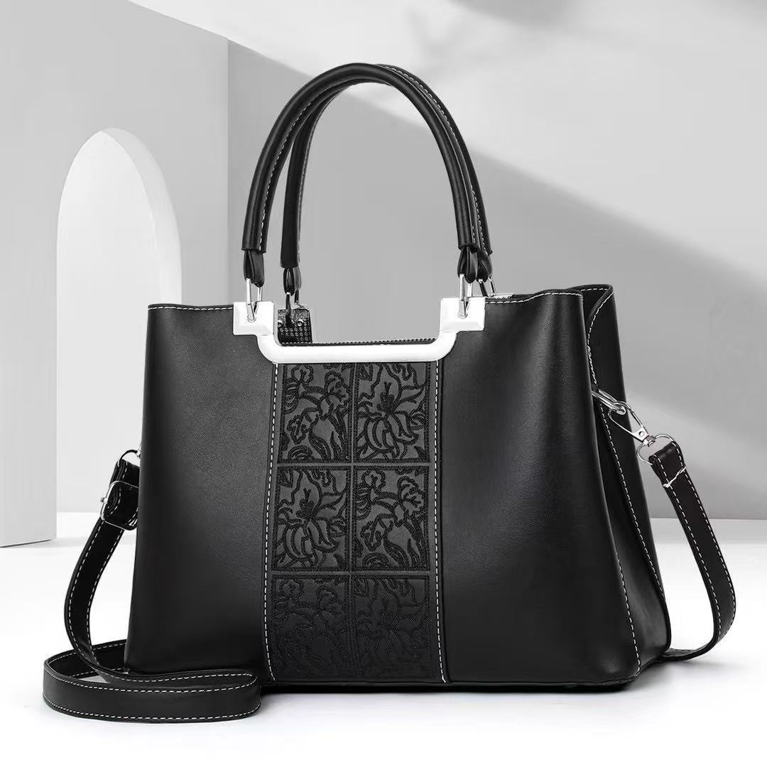 Bolso de madre atmosférico bolso de mujer simple de gran capacidad bolso de mensajero de hombro estilo explosivo bolso de marca de moda 2025