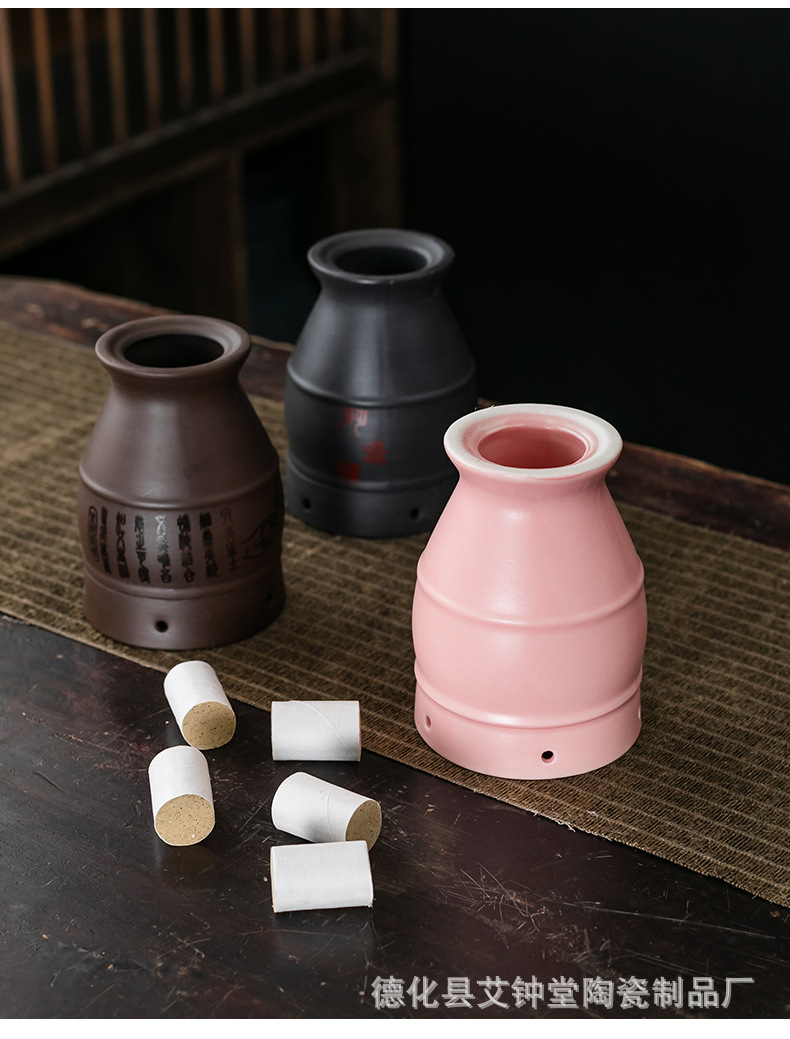 Aizhongtang Ceramic Moxibustion Jar with Gua Sha Massage Function Purple Clay Portable Home Warming Device in use