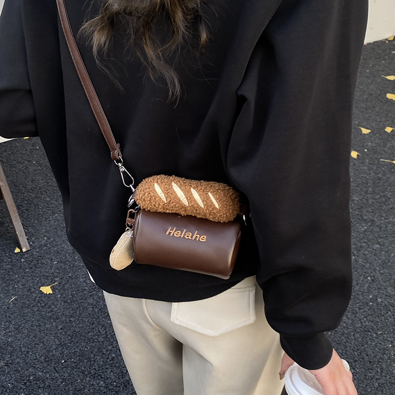 Hermosas galletas para niños y niñas bolsas de hombro compactas mini bolsas de cilindro para bebés de invierno y otoño peluche nuevas bolsas para niños