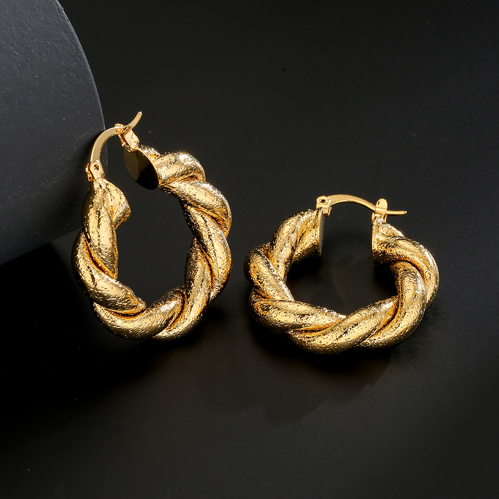 Fashion copper-plated 18K gold twist geometric earrings female