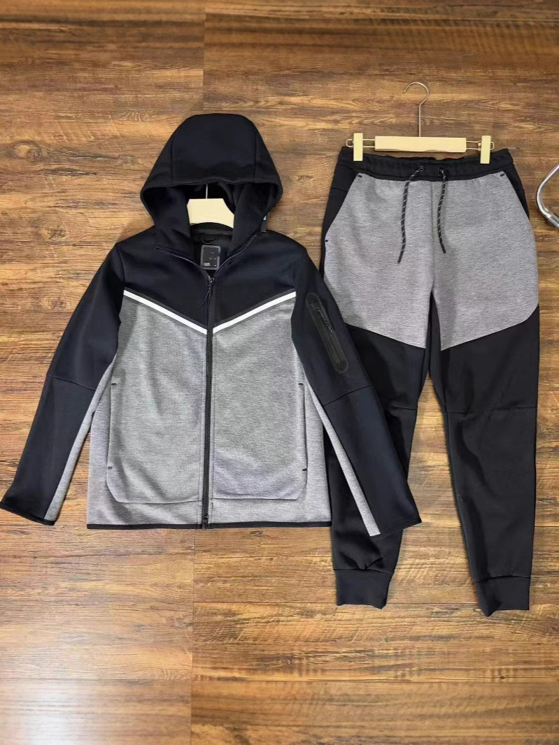 新しいメンズ春と秋のジャケットとズボンのフード付きスポーツカジュアルオールマッチスーツステッチフード付きジッパーウインドウォーカーシリーズ