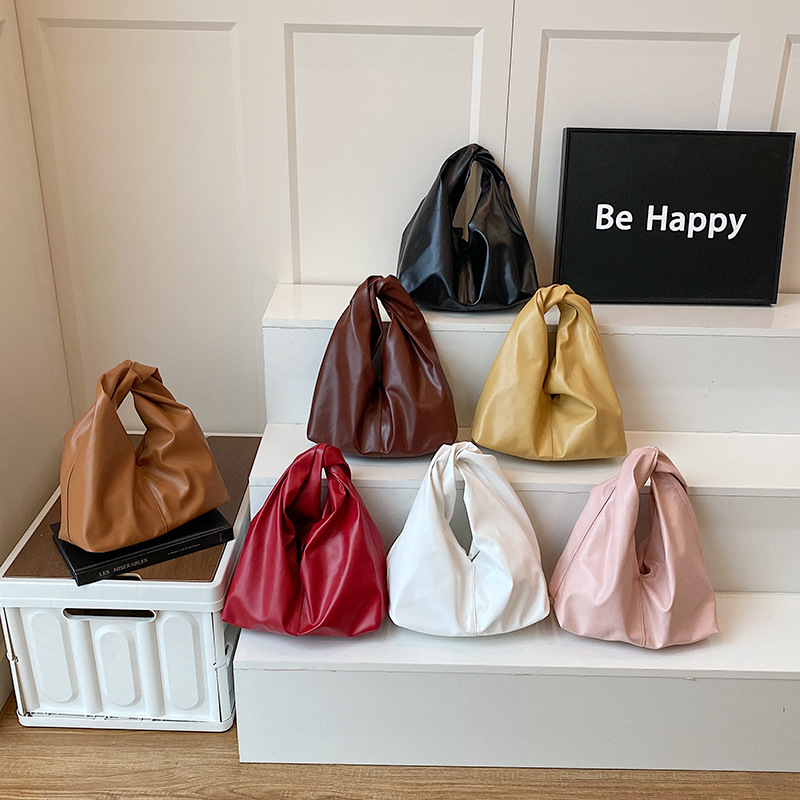 Diseño de nicho, bolso de mano de alta gama, primavera y verano, nueva moda, todo fósforo, simple, color sólido, bolso de mano casual, mujer