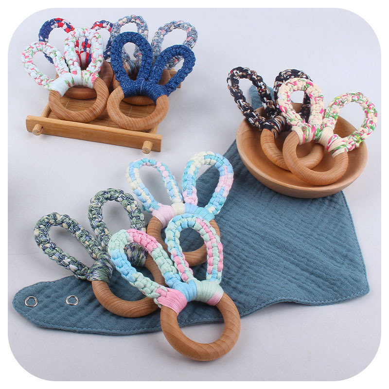 DIY bebé creativo Haya Orejas de conejo mordedor pulsera tejida a mano de algodón cuerda juguete dientes de bebé palo de molienda