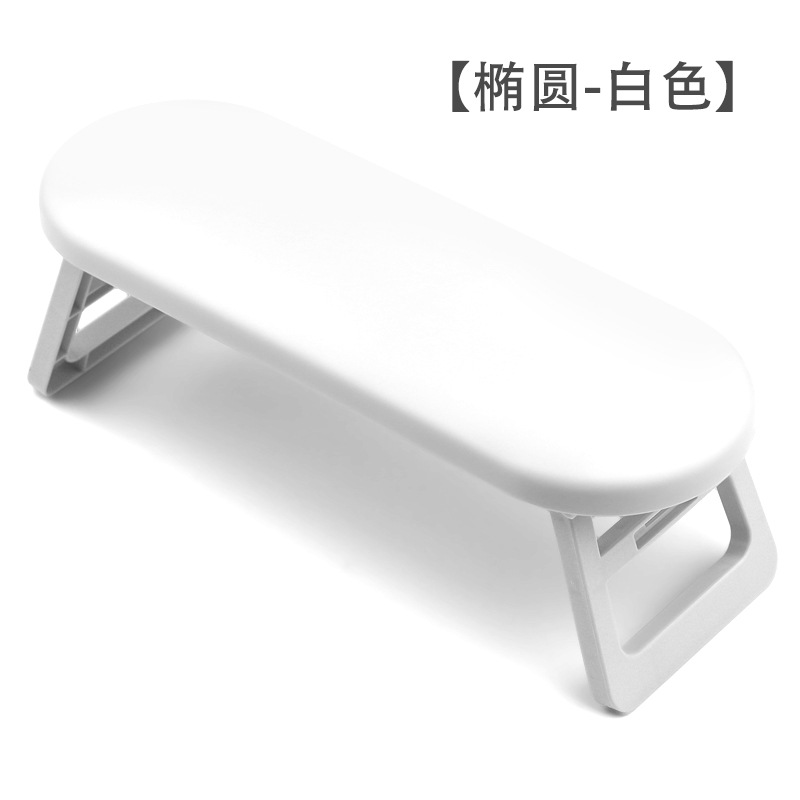 Transfronterizos manicuría almohada plegable y alta luz manicuría almohada de mano de plástico manicuría tienda de manicuras muñeca soporte almohada al por mayor