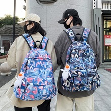 涂鸦设计款双肩包男士2022新款日韩潮流时尚旅行背包中学生书包女