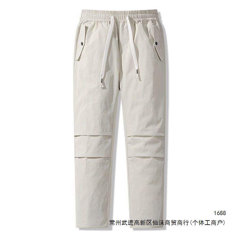 90% down men's and women's outdoor mountain style functional windproof and waterproof workwear with multiple pockets and drawstring closure, warm down trousers