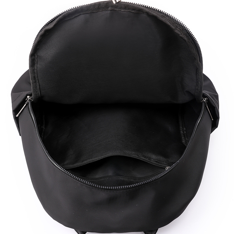 Spot al por mayor 2023 nueva mochila de nailon para mujer coreana simple y ligera mochila de viaje al aire libre mochila escolar de moda