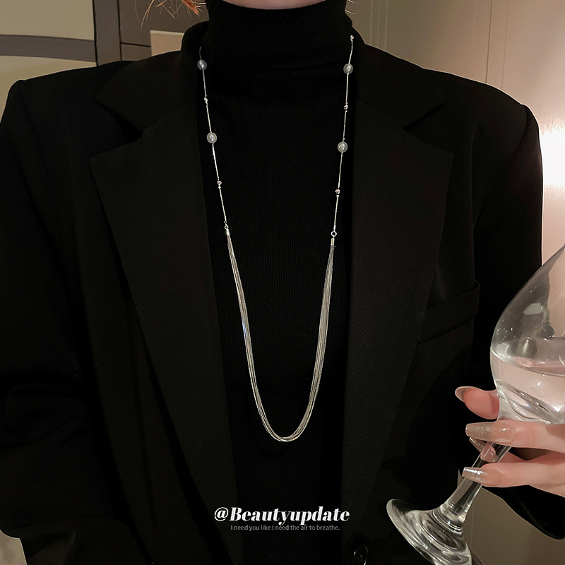 Luz de lujo largo multicapa apilados collar de perlas Otoño e Invierno versátil suéter clavícula cadena nicho de alta calidad accesorios al por mayor