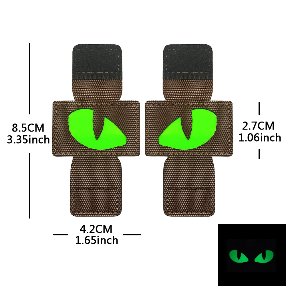 Creativo suministro personalizado gato ojo luminoso moral sello al aire libre militar fan mochila sello pequeño diablo militar MOLLE colgante