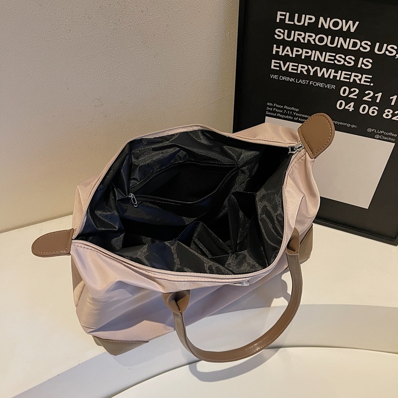 Bolsas de viaje transfronterizas de gran capacidad de sensación de alto nivel bolsas de bolsas de bolsas de alojamiento en espera de producción bolsa de almacenamiento de acondicionamiento físico bolsas portátiles al por mayor